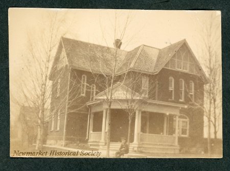 Historic full view of Westbourne House, showing its gables, verandah and grounds